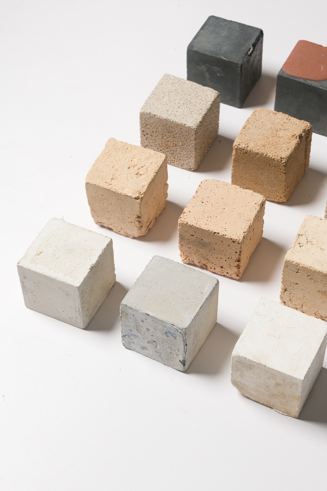 MarbleCast sample cubes in varied mineral colors and textures