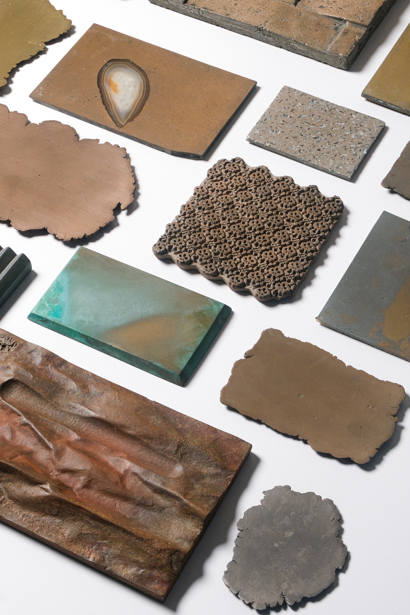 Metallium samples with varied metallic finishes and textures