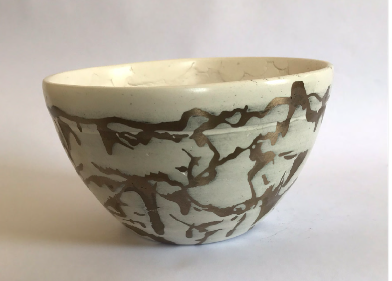 Decorative bowl with an expressive dark pattern designed by Opus Magnum Studio